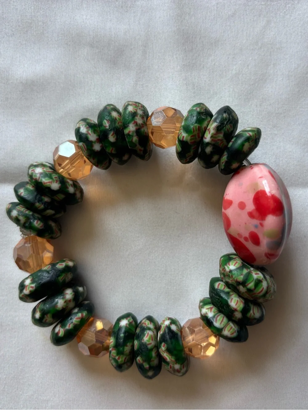 Green Millefiori Bead Stretch Bracelet with Pink Accent